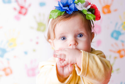 wall painted with baby-safe milk paint hand prints