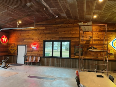 Interior view of a barn with wooden surfaces treated with finishing natural oils