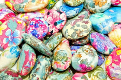 flat rocks painted with Real Milk paint becomes rock art