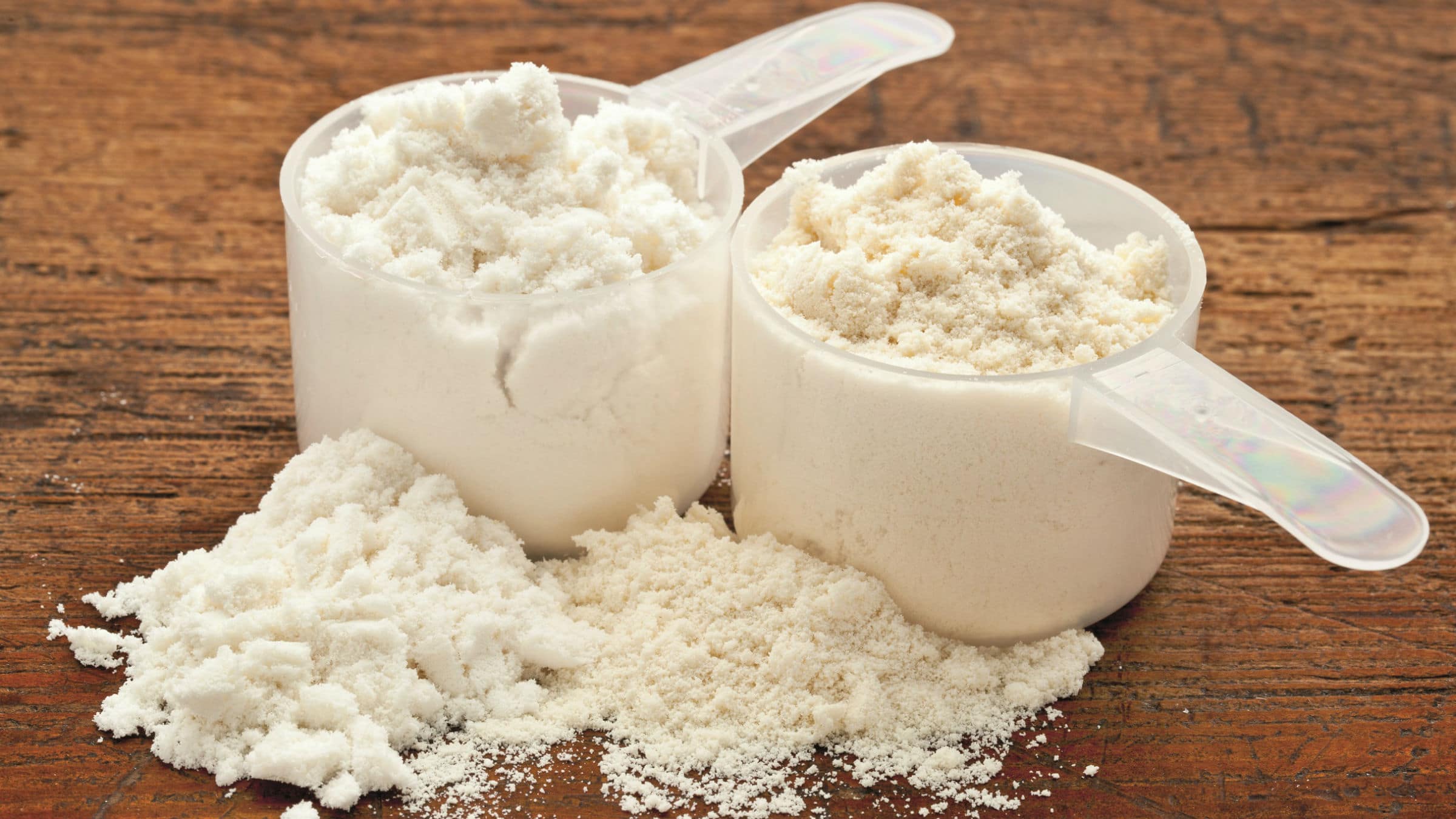 casein powder in measuring cups