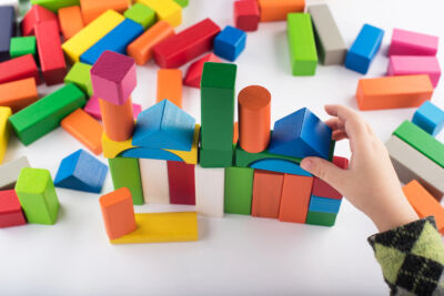 wood toys painted in a range of colorful tones
