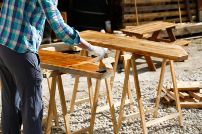 A man avoiding using mineral oil finish on wood surfaces