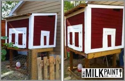 chicken coop with white trim and red wood stain