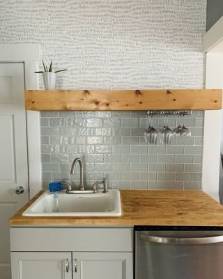 walnut butcher block countertops in kitchen with lighter wood color finish using linseed oil